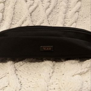 Small TUMI cosmetics bag